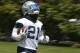 Dallas Cowboys running back Ezekiel Elliott (21) runs the ball during an organized team activity at its NFL football training facility in Frisco, Texas, Wednesday, May 23, 2018. (AP Photo/Ron Jenkins)