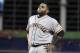 San Francisco Giants' Pablo Sandoval reacts after he flied out during the seventh inning of a baseball game against the Miami Marlins, Tuesday, June 12, 2018, in Miami. The Marlins won 3-1. (AP Photo/Lynne Sladky)