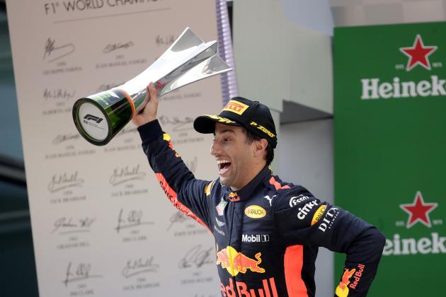 Red Bull driver Daniel Ricciardo of Australia celebrates with his trophy after winning the Chinese Formula One Grand Prix at the Shanghai International Circuit in Shanghai, Sunday, April 15, 2018. (AP Photo/Andy Wong)