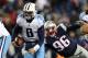 FOXBOROUGH, MA - JANUARY 13: Marcus Mariota #8 of the Tennessee Titans is tackled by Geneo Grissom #96 of the New England Patriots during the fourth quarter in the AFC Divisional Playoff game at Gillette Stadium on January 13, 2018 in Foxborough, Massachusetts. (Photo by Elsa/Getty Images)