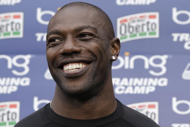 FILE - In this Aug. 8, 2012 file photo, Seattle Seahawks' Terrell Owens smiles during NFL football training camp in Renton, Wash. Both Owens and San Francisco 49ers wide receiver Randy Moss are both determined to return to their dominating deep threats they were in their primes. (AP Photo/Ted S. Warren, file)