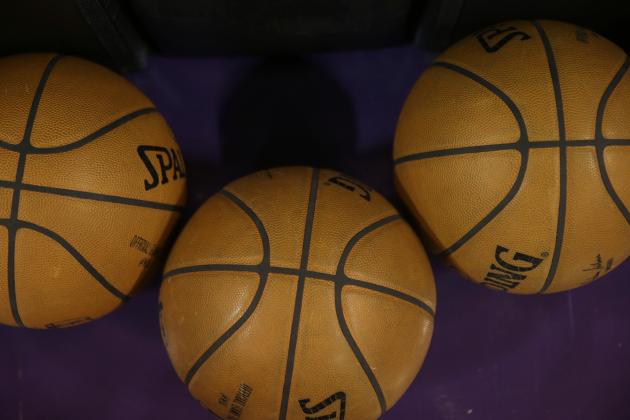 Basketballs are seen on the court during warm ups before the Dallas Mavericks played the Sacramento Kings in an NBA basketball game in Sacramento, Calif., Monday, Nov. 30, 2015.(AP Photo/Rich Pedroncelli)