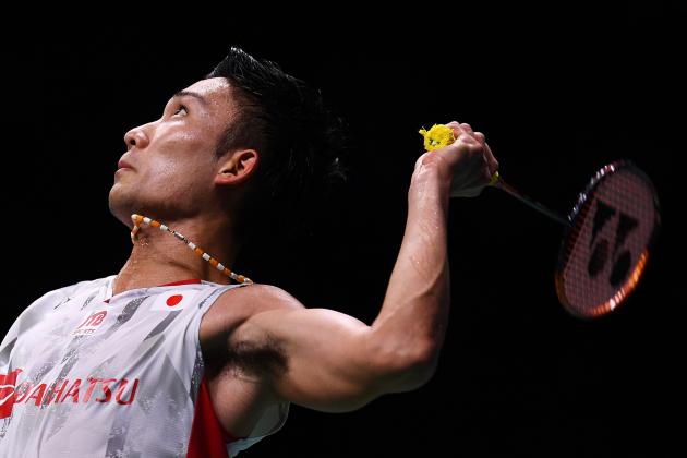 Kento Momota of Japan hits a shot against Shi Yuqi of China in the men's singles final during the badminton World Championships in Nanjing, Jiangsu province on August 5, 2018. (Photo by Johannes EISELE / AFP)        (Photo credit should read JOHANNES EISELE/AFP/Getty Images)