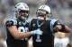 FILE - In this Dec. 17, 2017, file photo, Carolina Panthers' Greg Olsen (88) celebrates with Cam Newton (1) after a touchdown against the Green Bay Packers during the second half of an NFL football game in Charlotte, N.C. The New Orleans Saints have to prepare for the presence of Olsen, who didn’t play in either of these teams’ previous two meetings this season. (AP Photo/Mike McCarn, File)