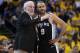 OAKLAND, CA - APRIL 14: Head coach Gregg Popovich of the San Antonio Spurs talks with his player Tony Parker #9 against the Golden State Warriors in the second quarter during Game One of the first round of the 2018 NBA Playoff at ORACLE Arena on April 14, 2018 in Oakland, California. NOTE TO USER: User expressly acknowledges and agrees that, by downloading and or using this photograph, User is consenting to the terms and conditions of the Getty Images License Agreement. (Photo by Thearon W. Henderson/Getty Images)