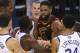 Cleveland Cavaliers center Tristan Thompson, facing, confronts Golden State Warriors forward Draymond Green, second from bottom left, during overtime of Game 1 of basketball's NBA Finals in Oakland, Calif., Thursday, May 31, 2018. The Warriors won 124-114. (AP Photo/Ben Margot)
