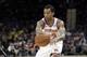 New York Knicks' Trey Burke passes against the Cleveland Cavaliers in the second half of an NBA basketball game, Wednesday, April 11, 2018, in Cleveland. (AP Photo/Tony Dejak)
