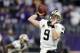 New Orleans Saints quarterback Drew Brees (9) throws before an NFL divisional football playoff game against the Minnesota Vikings in Minneapolis, Sunday, Jan. 14, 2018. (AP Photo/Charlie Neibergall)