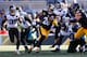 PITTSBURGH, PA - JANUARY 14: Le'Veon Bell #26 of the Pittsburgh Steelers runs with the ball against the Jacksonville Jaguars during the first half of the AFC Divisional Playoff game at Heinz Field on January 14, 2018 in Pittsburgh, Pennsylvania. (Photo by Kevin C. Cox/Getty Images)
