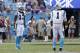 Carolina Panthers' Kelvin Benjamin (13) looks to Cam Newton (1) before a play in the second half of an NFL football game against the Minnesota Vikings in Charlotte, N.C., Sunday, Sept. 25, 2016. (AP Photo/Bob Leverone)