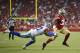 San Francisco 49ers running back Jeremy McNichols (33) runs against Dallas Cowboys defensive back Kam Kelly during the second half of an NFL preseason football game in Santa Clara, Calif., Thursday, Aug. 9, 2018. (AP Photo/Josie Lepe)