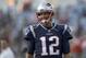 New England Patriots quarterback Tom Brady smiles as he takes the field to warm up before a preseason NFL football game against the Washington Redskins, Thursday, Aug. 9, 2018, in Foxborough, Mass. (AP Photo/Charles Krupa)