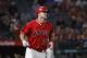 Los Angeles Angels' Mike Trout reacts after hitting a fly ball during the ninth inning of a baseball game against the Seattle Mariners, Wednesday, July 11, 2018, in Anaheim, Calif. (AP Photo/Jae C. Hong)