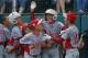 Japan's Seiya Arai, second from right, celebrates scoring the game-winning run on a single by Natsuki Yajima off Lufkin, Texas' Malcolm Deason in the fifth inning of the Little League World Series Championship baseball game in South Williamsport, Pa., Sunday, Aug. 27, 2017. Japan won 12-2 in five innings. (AP Photo/Gene J. Puskar).