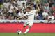 Real Madrid's Croatian midfielder Luka Modric prepares to kick the ball during the Santiago Bernabeu Trophy football match between Real Madrid and AC Milan in Madrid on August 11, 2018. (Photo by GABRIEL BOUYS / AFP) (Photo credit should read GABRIEL BOUYS/AFP/Getty Images)