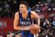 LAS VEGAS, NV - JULY 12: Kevin Knox #20 of the New York Knicks handles the ball against the Boston Celtics during the 2018 Las Vegas Summer League on July 12, 2018 at the Thomas & Mack Center in Las Vegas, Nevada. NOTE TO USER: User expressly acknowledges and agrees that, by downloading and/or using this Photograph, user is consenting to the terms and conditions of the Getty Images License Agreement. Mandatory Copyright Notice: Copyright 2018 NBAE (Photo by Garrett Ellwood/NBAE via Getty Images)