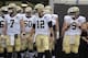 New Orleans Saints quarterback Taysom Hill (7), quarterback Tom Savage (12) and quarterback Drew Brees (9) wait to run onto the field during team introductions before an NFL preseason football game against the Jacksonville Jaguars Thursday, Aug. 9, 2018, in Jacksonville, Fla. (AP Photo/Phelan M. Ebenhack)