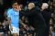Manchester City's Spanish manager Pep Guardiola (R) gestures to Manchester City's English midfielder Raheem Sterling (L) during the English Premier League football match between Manchester City and West Bromwich Albion at the Etihad Stadium in Manchester, north west England, on January 31, 2018. / AFP PHOTO / Lindsey PARNABY / RESTRICTED TO EDITORIAL USE. No use with unauthorized audio, video, data, fixture lists, club/league logos or 'live' services. Online in-match use limited to 75 images, no video emulation. No use in betting, games or single club/league/player publications. / (Photo credit should read LINDSEY PARNABY/AFP/Getty Images)