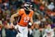DENVER, CO - DECEMBER 31: Quarterback Paxton Lynch #12 of the Denver Broncos looks downfield against the Kansas City Chiefs at Sports Authority Field at Mile High on December 31, 2017 in Denver, Colorado. (Photo by Dustin Bradford/Getty Images)