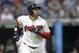 Cleveland Indians' Leonys Martin watches his ball after hitting a solo home run off Los Angeles Angels starting pitcher Felix Pena in the sixth inning of a baseball game, Saturday, Aug. 4, 2018, in Cleveland. (AP Photo/Tony Dejak)