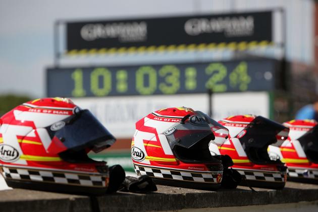 DOUGLAS, ISLE OF MAN - JUNE 08: Helmets line the pit wall before the superbike TT race in Douglas on June 8, 2009, Isle Of Man, United Kingdom. The annual TT race is one of the highlights of the motorbike racing calender with fans travelling from around the globe to watch riders compete in the 37 and three quarter mile lap exceeding speeds of 200mph. (Photo by Dan Kitwood/Getty Images)