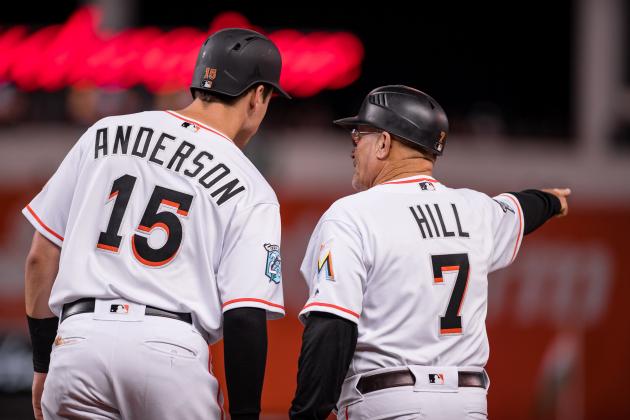 MIAMI, FL - APRIL 2: Brian Anderson #15 of the Miami Marlins talks with first base coach Perry Hill #7 during the game against the Boston Red Sox at Marlins Park on April 2, 2018 in Miami, Florida. (Photo by Rob Foldy/Miami Marlins via Getty Images)