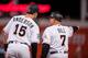 MIAMI, FL - APRIL 2: Brian Anderson #15 of the Miami Marlins talks with first base coach Perry Hill #7 during the game against the Boston Red Sox at Marlins Park on April 2, 2018 in Miami, Florida. (Photo by Rob Foldy/Miami Marlins via Getty Images)