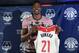 Washington Wizards recently acquired center Dwight Howard poses for a photo during a news conference in Washington, Monday, July 23, 2018. Howard, an eight-time All-Star, averaged 16.6 points per game and 12.5 rebounds last season with the Charlotte Hornets. (AP Photo/Susan Walsh)