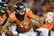 Denver Broncos quarterback Paxton Lynch gets sacked by Minnesota Vikings defensive tackle Jaleel Johnson during the first half in an NFL football preseason game Saturday, Aug. 11, 2018, in Denver. (AP Photo/Mark Reis)
