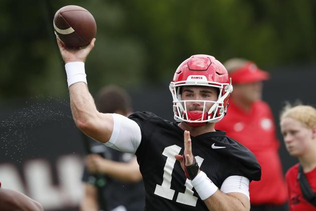 Georgia quarterback Jake Fromm (11) throws a pass during their NCAA college football training camp practice Friday, Aug. 3, 2018 in Athens, Ga. (AP Photo/John Bazemore)