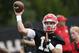 Georgia quarterback Jake Fromm (11) throws a pass during their NCAA college football training camp practice Friday, Aug. 3, 2018 in Athens, Ga. (AP Photo/John Bazemore)