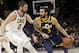 Utah Jazz's Ricky Rubio (3), from Spain, drives past Cleveland Cavaliers' Kevin Love (0) in the first half of an NBA basketball game, Saturday, Dec. 16, 2017, in Cleveland. (AP Photo/Tony Dejak)