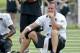 Pittsburgh Steelers quarterback Ben Roethlisberger sits on his helmet at practice during NFL football training camp in Latrobe, Pa., Tuesday, Aug. 7, 2018 . (AP Photo/Keith Srakocic)