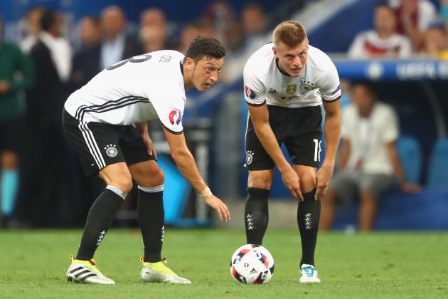 MARSEILLE, FRANCE - JULY 07:  Toni Kroos  (R) of Germany reacts with his team mate Mesut Oezil during the UEFA EURO semi final match between Germany and France at Stade Velodrome on July 7, 2016 in Marseille, France.  (Photo by Alexander Hassenstein/Getty Images)