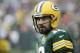 Green Bay Packers quarterback Aaron Rodgers warms up before a preseason NFL football game against the Pittsburgh Steelers Thursday, Aug. 16, 2018, in Green Bay, Wis. (AP Photo/Mike Roemer)