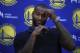 Golden State Warriors' DeMarcus Cousins ponders a question from a reporter during a media conference Thursday, July 19, 2018, in Oakland, Calif. Cousins signed a one-year, $5.3M deal with the defending champion Warriors. (AP Photo/Ben Margot)