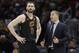 Cleveland Cavaliers coach Tyronn Lue talks with Kevin Love during the second half in Game 4 against the Golden State Warriors in basketball's NBA Finals, Friday, June 8, 2018, in Cleveland. (AP Photo/Tony Dejak)