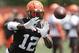 Cleveland Browns wide receiver Josh Gordon catches a pass during practice at the NFL football team's training camp facility, Wednesday, June 13, 2018, in Berea, Ohio. (AP Photo/Tony Dejak)