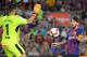 Alaves' Spanish goalkeeper Fernando Pacheco (L) blocks a shot on goal by Barcelona's Argentinian forward Lionel Messi during the Spanish league football match between Barcelona and Alaves at the Camp Nou stadium in Barcelona on August 18, 2018. (Photo by LLUIS GENE / AFP) (Photo credit should read LLUIS GENE/AFP/Getty Images)