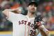 HOUSTON, TX - AUGUST 14: Justin Verlander #35 of the Houston Astros pitches in the first inning against the Colorado Rockies at Minute Maid Park on August 14, 2018 in Houston, Texas. (Photo by Bob Levey/Getty Images)