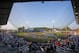 The Pittsburgh Pirates and St. Louis Cardinals line the baselines, and the 16 Little League teams from around the world participating in the Little League World Series line the infield before the Little League Classic baseball game between the Pirates and the Cardinals at Bowman Field in Williamsport, Pa., Sunday, Aug. 20, 2017. (AP Photo/Gene J. Puskar)