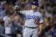Los Angeles Dodgers relief pitcher Zac Rosscup calls for a new ball after giving up a two-run home run to Colorado Rockies' Ryan McMahon during the seventh inning of a baseball game Friday, Aug. 10, 2018, in Denver. (AP Photo/David Zalubowski)