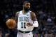 FILE - In this Feb. 28, 2018, file photo, Boston Celtics guard Kyrie Irving (11) moves down court during the first quarter of an NBA basketball game in Boston. A person with knowledge of the situation says Celtics point guard Kyrie Irving will miss the rest of the regular season and playoffs after surgery on his left knee. The official spoke on the condition of anonymity to The Associated Press because the team has not released the news. (AP Photo/Charles Krupa)
