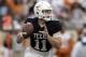 Texas Longhorns quarterback Sam Ehlinger (11) looks to throw during the team's Orange-White intrasquad spring college football game, Saturday, April 21, 2018, in Austin, Texas. (AP Photo/Eric Gay)