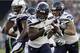 Seattle Seahawks running back Chris Carson (32) runs against the Los Angeles Chargers during the first half of an NFL preseason football game Saturday, Aug. 18, 2018, in Carson, Calif. (AP Photo/Gregory Bull)
