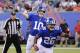 New York Giants quarterback Eli Manning (10) throws a pass as teammate Saquon Barkley (26) blocks during the first half of a preseason NFL football game against the Cleveland Browns Thursday, Aug. 9, 2018, in East Rutherford, N.J. (AP Photo/Bill Kostroun)