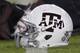 A Texas A&M player's helmet sits near the 50 yard line on Kyle Field before the start of an NCAA college football game against Ole Miss Saturday, Nov. 12, 2016, in College Station, Texas. (AP Photo/Sam Craft)