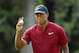 Tiger Woods walks off the 17th green during the final round of the PGA Championship golf tournament at Bellerive Country Club, Sunday, Aug. 12, 2018, in St. Louis. (AP Photo/Charlie Riedel)
