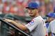 Chicago Cubs pitcher Yu Darvish stands in the dugout before the team's baseball game against the St. Louis Cardinals on Saturday, June 16, 2018, in St. Louis. (AP Photo/Jeff Roberson)