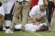 Tampa Bay Buccaneers' Charles Sims is attended to after being injured in the first half of a preseason NFL football game against the Tennessee Titans Saturday, Aug. 18, 2018, in Nashville, Tenn. (AP Photo/James Kenney)